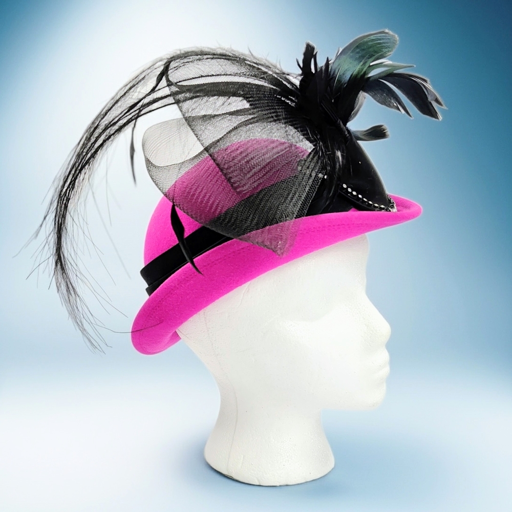 Elegant Pink Fascinator Hat with Black Feather Accents